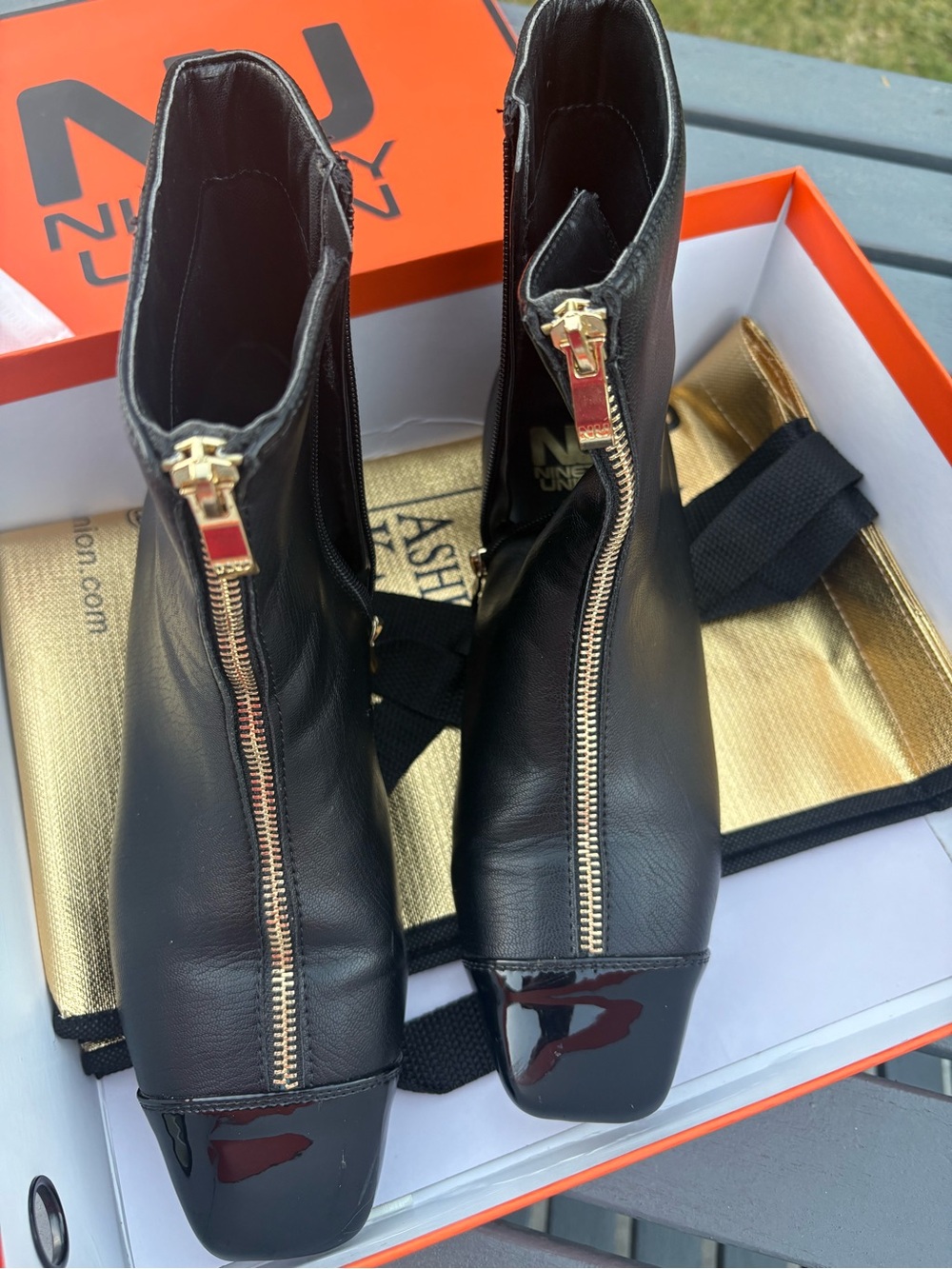 Ninety Union Black Leather Ankle Booties with Gold Front and Side Zipper